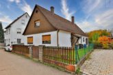 Im Bieterverfahren: Einfamilienhaus mit Potenzial in hervorragender Lage - Außenansicht_1